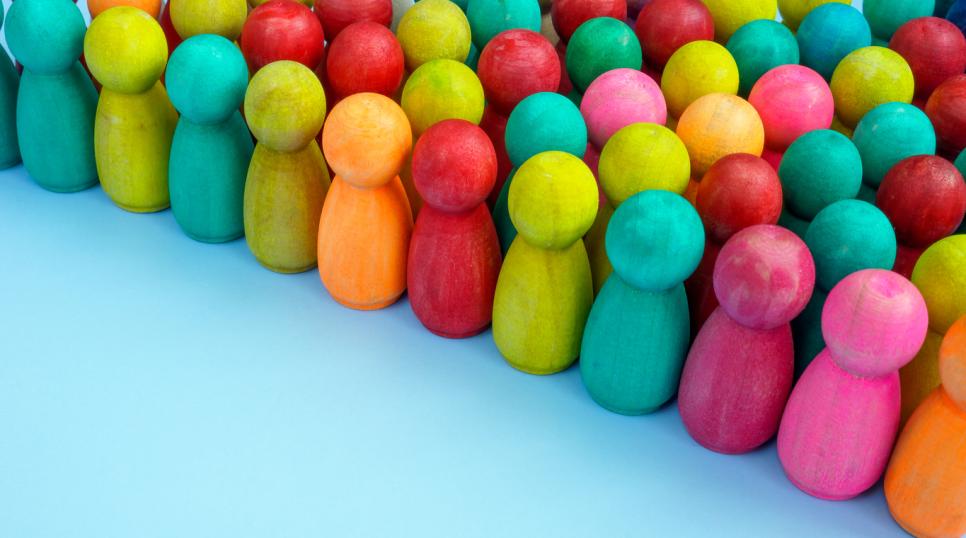 A crowd of coloured figures diversity and inclusion - iStock image